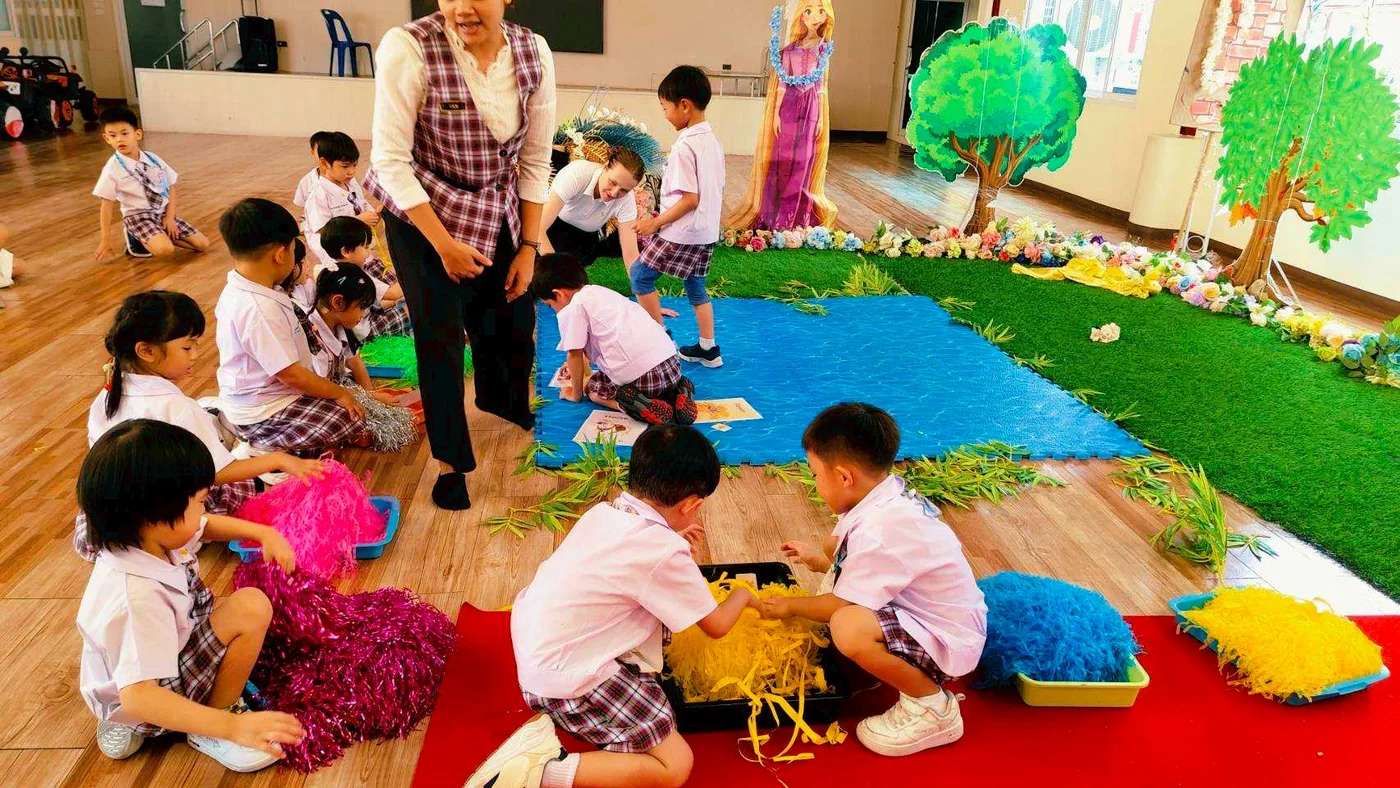 Children exploring a nature-themed classroom project